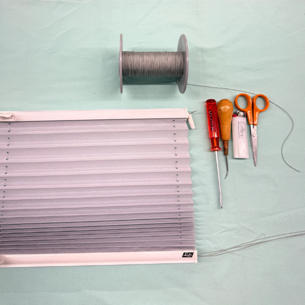 Plissee Reparatur – gerissene Schnüre